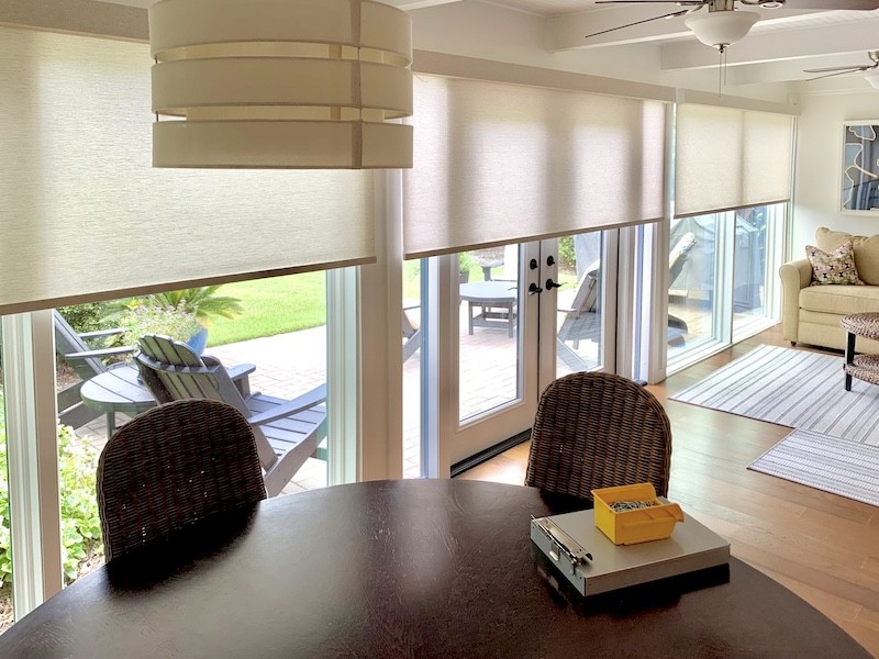 Looking to upgrade your home with a modern style? Our gorgeous roller shades offer ample privacy and shade, while elevating your home's interior. We love the way this local Hilton Head Island home matched their shades to create a cohesive appearance in this space. Be sure to check out our motorized