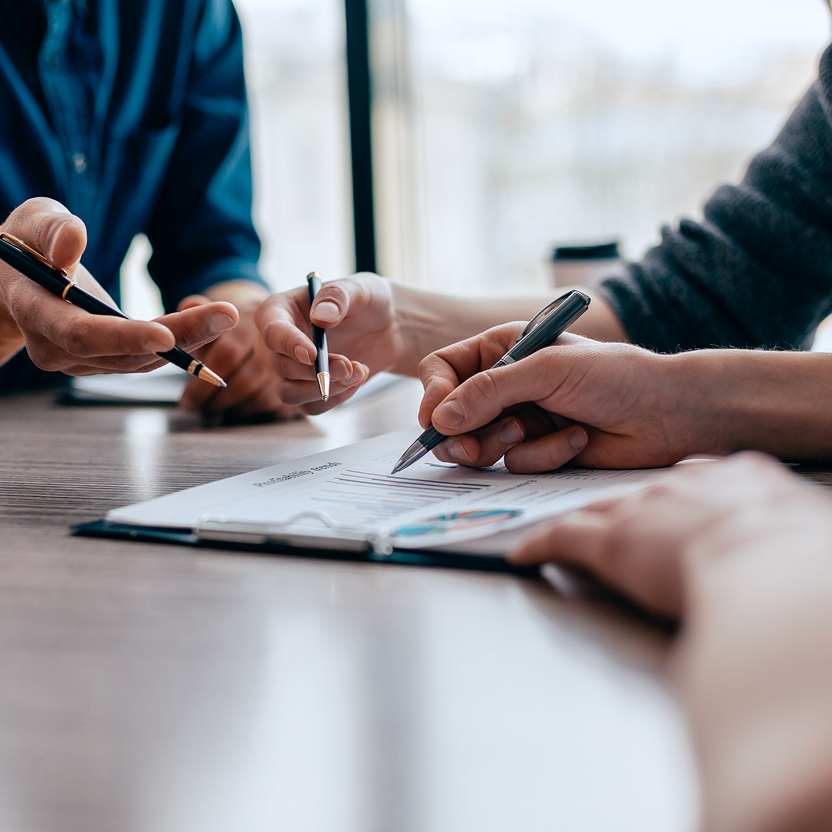 Investment experts reviewing a portfolio.