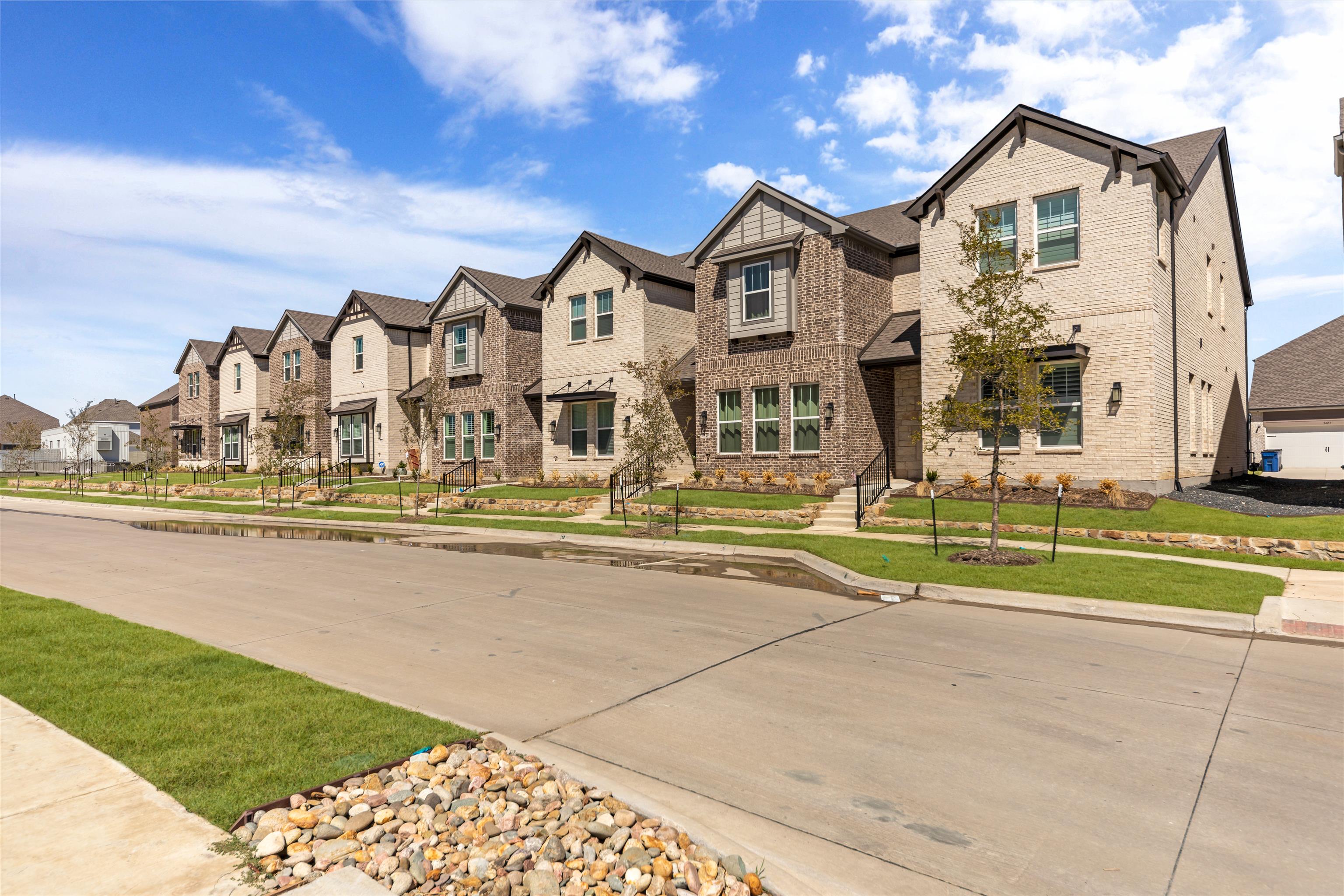 The  Station Townhomes by Ashton Woods in Sachse TX