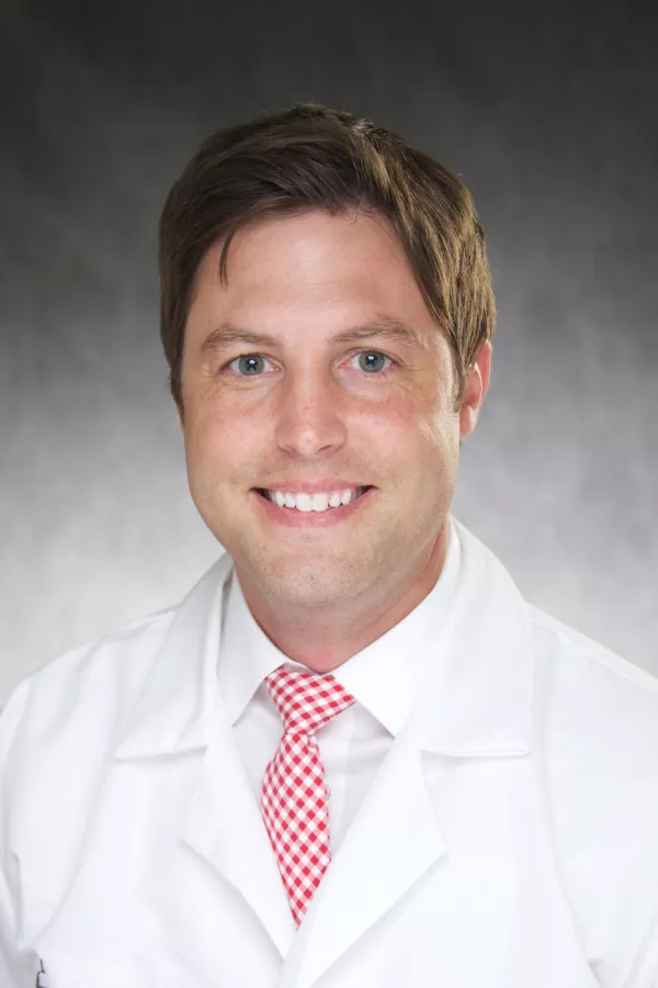 Justin  Wikle,  MD