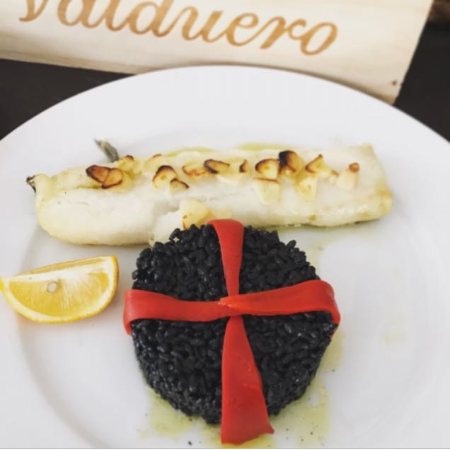 Lomo de Bacalao- fresh Cod Fish served with black risotto. 🍷🇪🇸