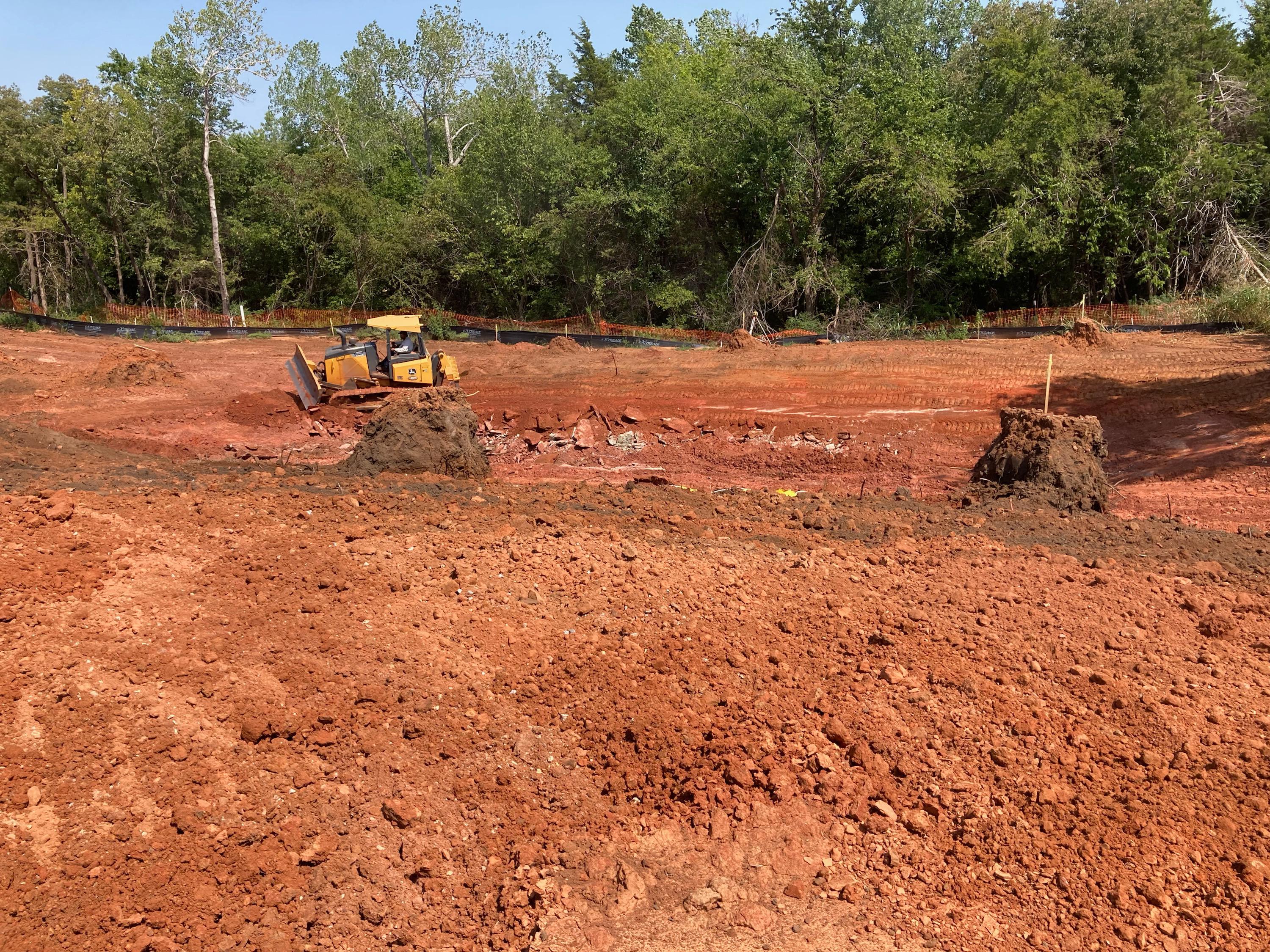 Water detention pond being completed