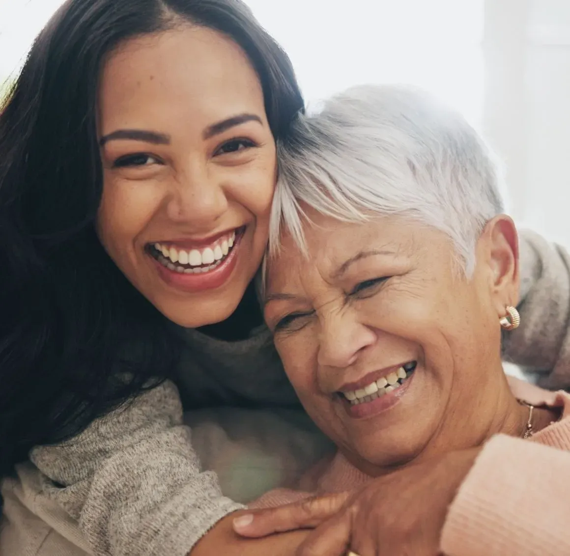 Caregiver with Senior Woman
Pure joy radiates between a caregiver and her client in this heartfelt embrace. At CareGivers of America, we believe quality care isn't just about what we do &mdash; it's about how we make our clients feel: loved, valued, and never alone.
