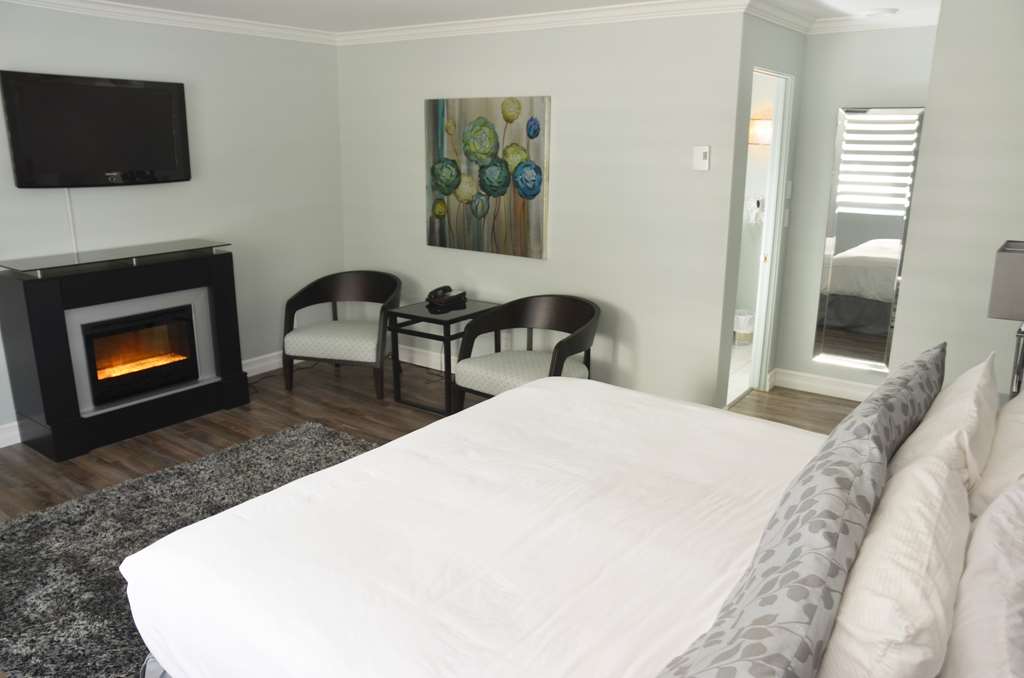 Suite King Fireplace Dannys Suites, SureStay Collection By Best Western Beresford (506)546-6621