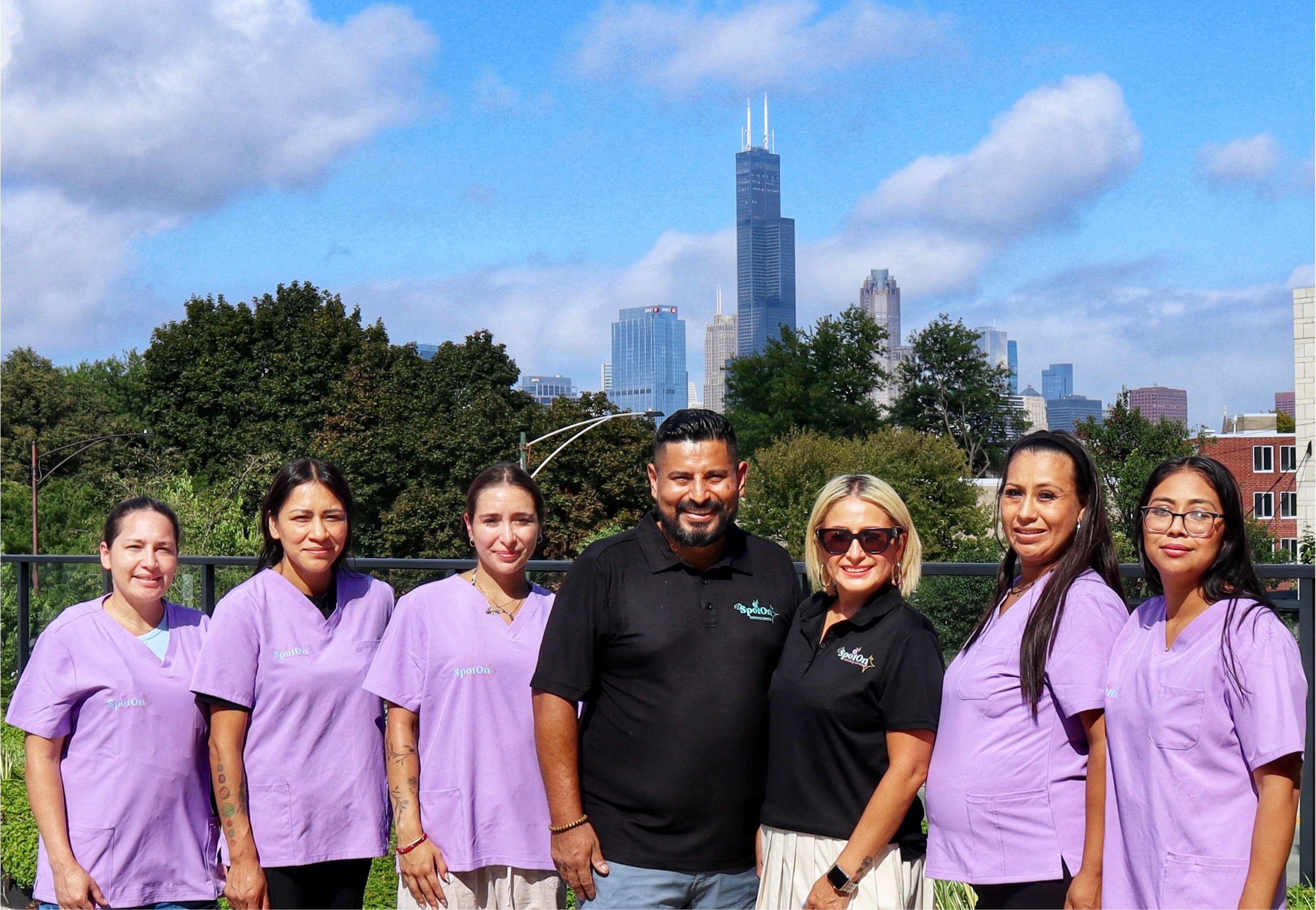 Full team with Chicago's skyline in the background 