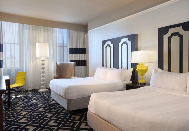 Our queen guest room features two queen size beds with thick mattresses and plush bedding.