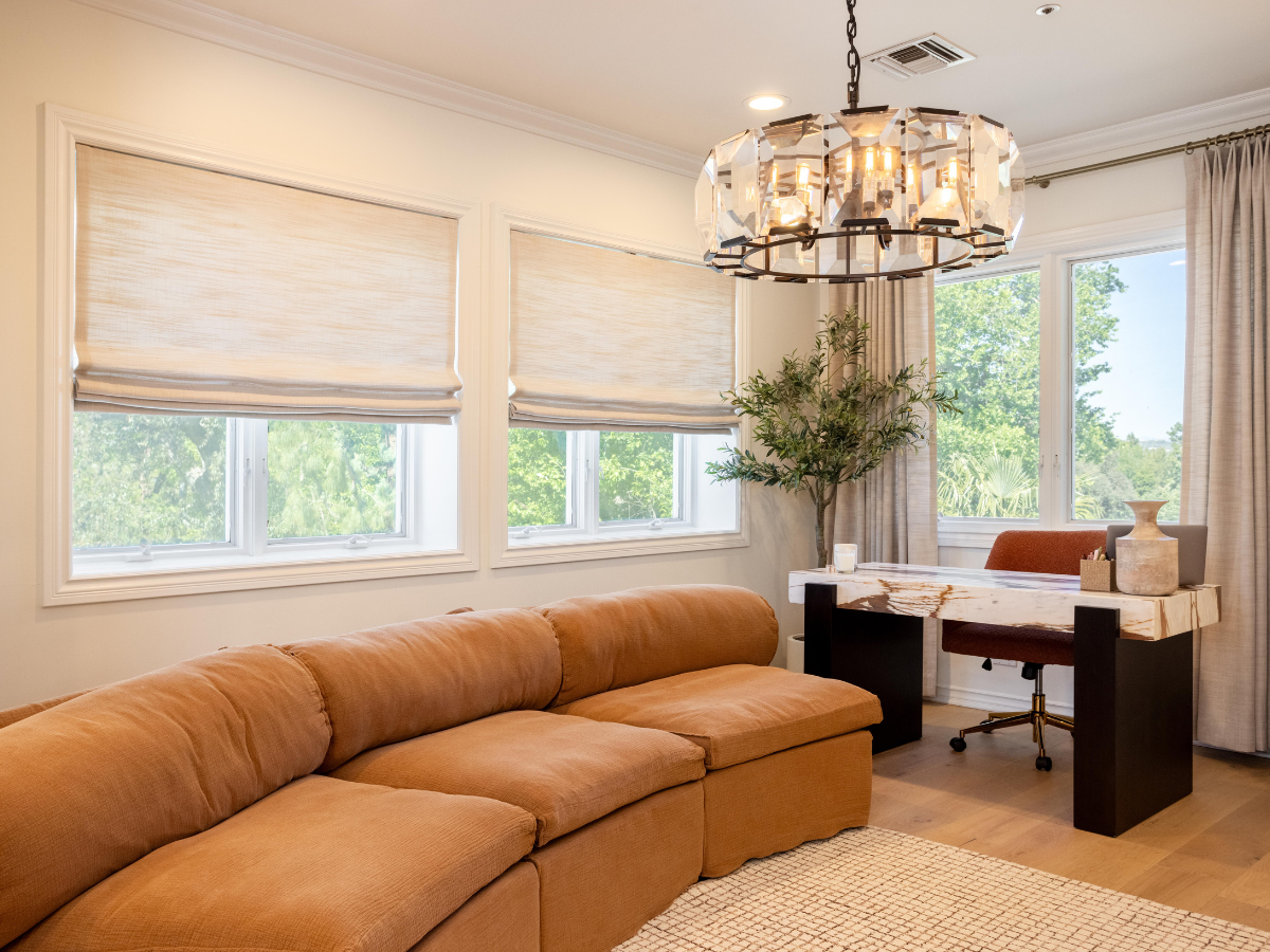 Enhance your home office with our elegant Roman shades and drapery. Match your aesthetic, reduce glare, and creative a productive space that perfectly fits your vibe.