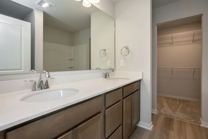 Bathroom with large mirror