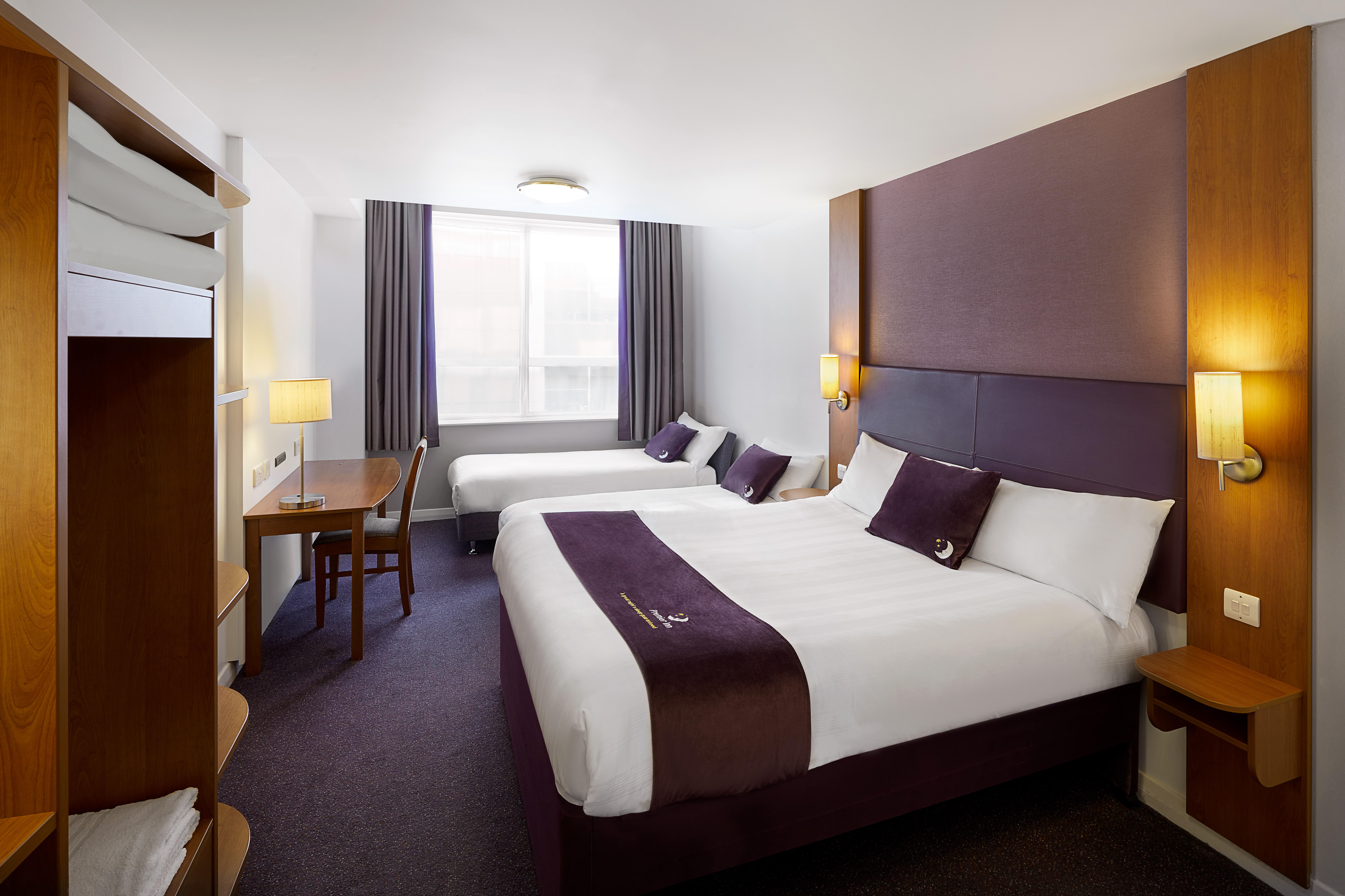 Premier Inn family room with double bed and two single beds