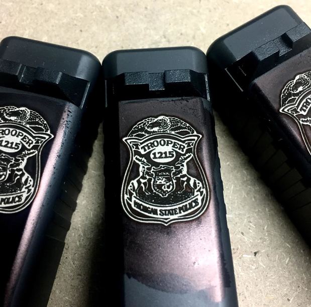 Images Armory Valentine, LLC Cerakote Coating, Laser Engraving & Custom Holsters