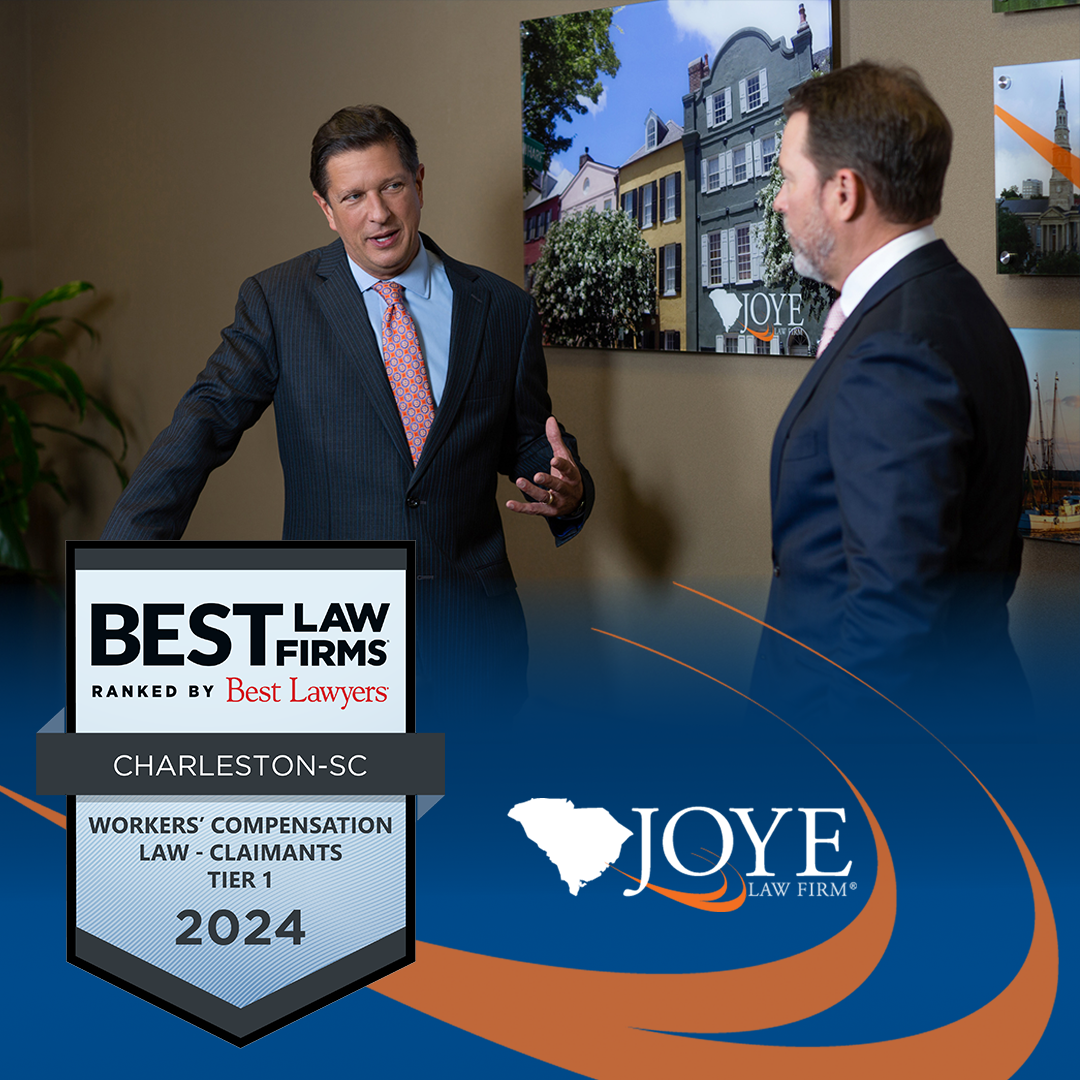 Joye Law Firm Partners Ken Harrell and Mark Joye with badge for Best Law Firms by Best Lawyers awards for Workers' Compensation Law - Claimants Tier 1 in Charleston, S.C.