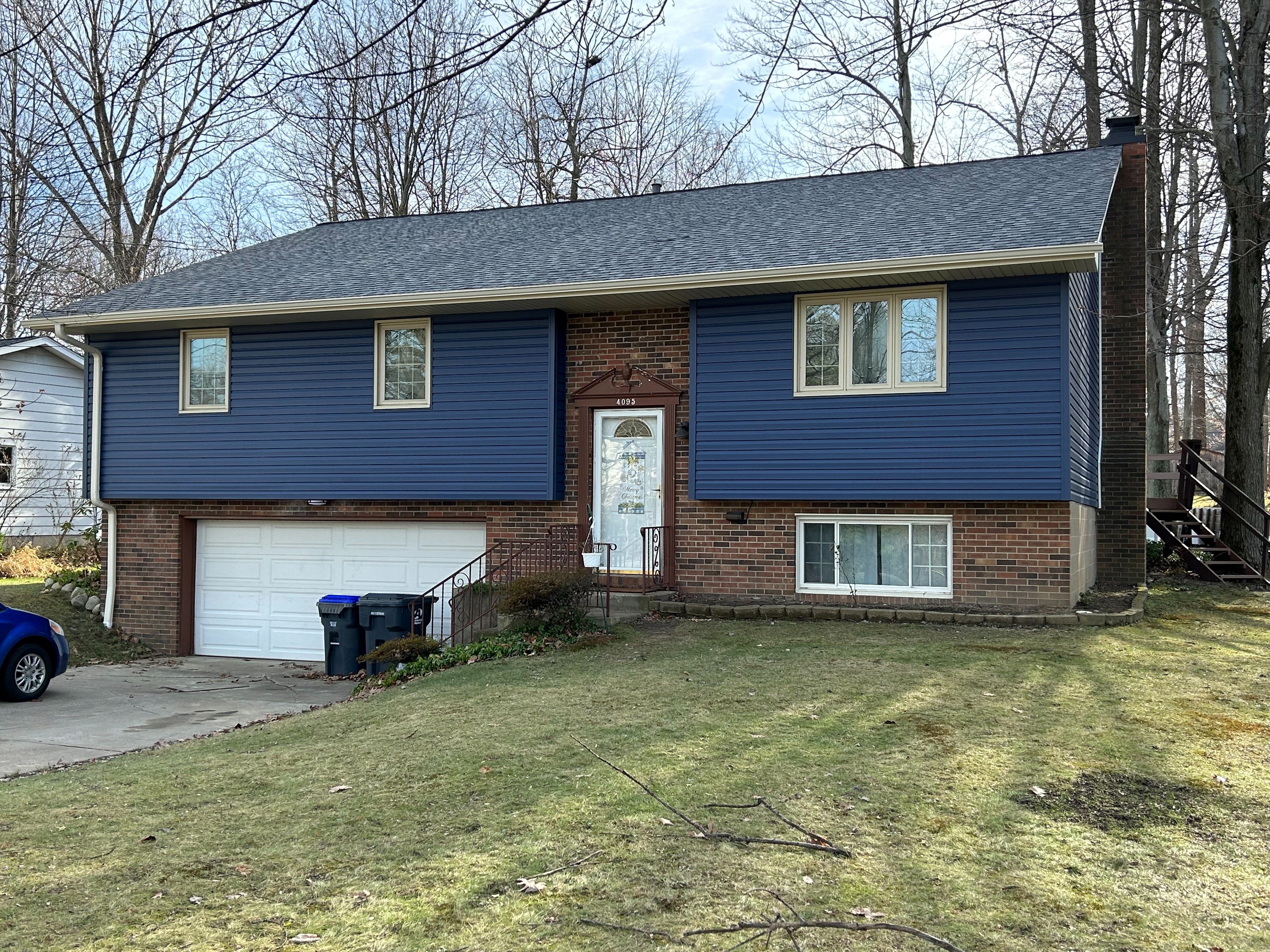 This home in Erie County, PA completed their update without going over budget.  They installed a new roof using Daugherty Roofing 814 and decided to repurpose their existing siding by painting it - giving the entire home a beautiful new look