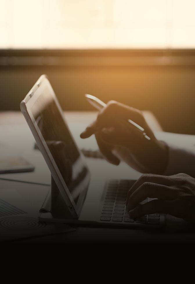 Close-up of a professional working on their tablet.
