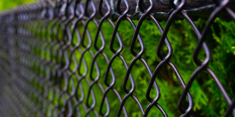 WE OFFER HIGH-QUALITY CHAIN LINK FENCES TO HELP YOU PROTECT YOUR PROPERTY.