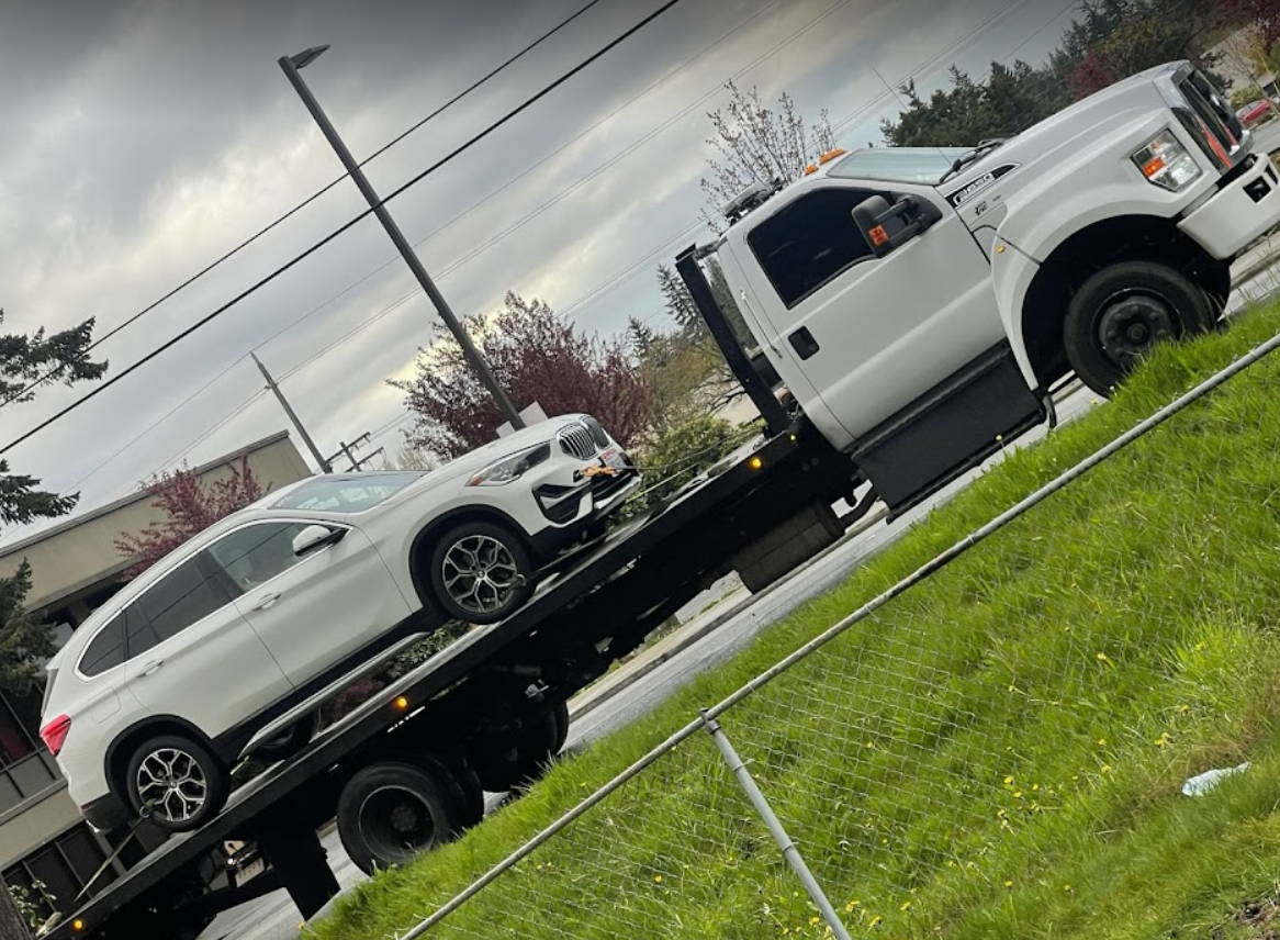 OMG Everett Towing Logo