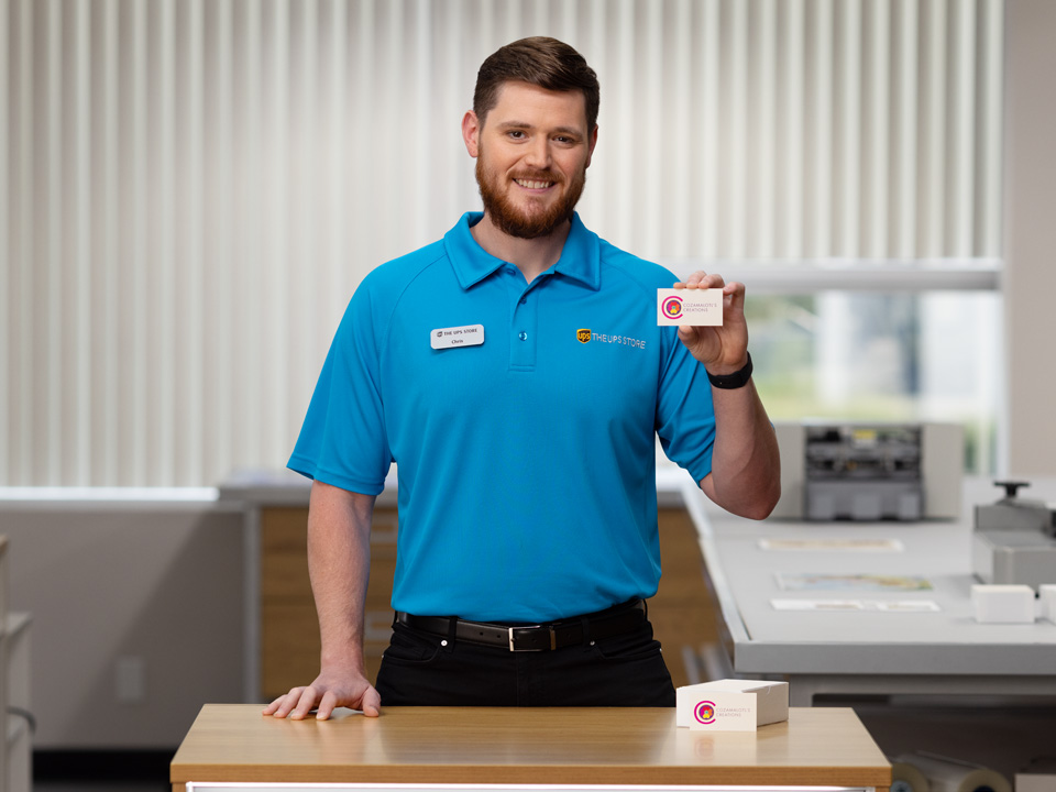 The UPS Store Associate with a fresh business card