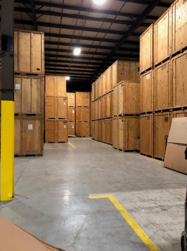 Warehouse and storage area. This is where the customer shipments are loaded and unloaded. If there is a gap in the arrival and departure date, we store the household goods in the wooden crates.