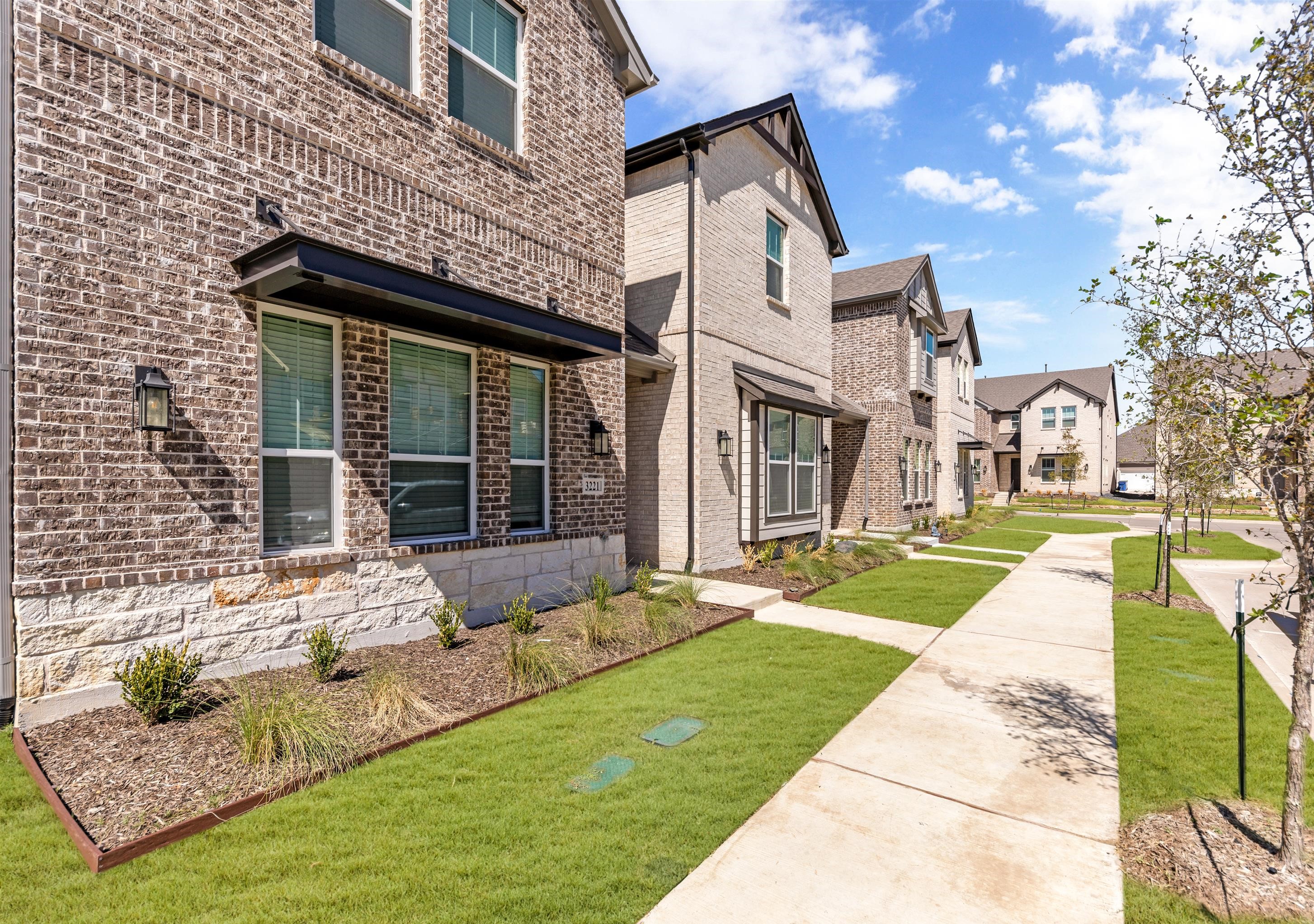 The  Station Townhomes by Ashton Woods in Sachse TX