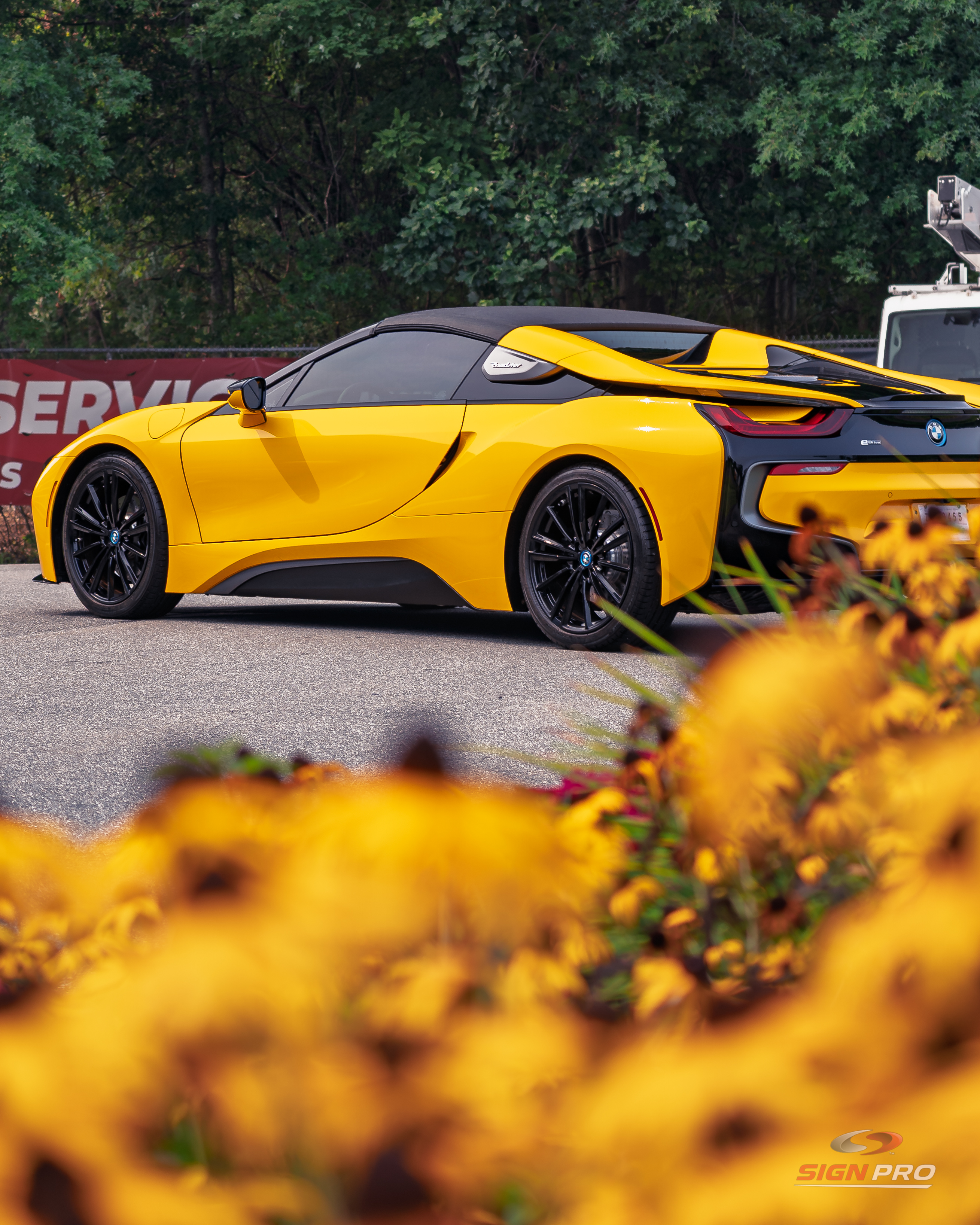 Custom vehicle graphics and accent wrap installed by Sign Pro on a BMW i8, enhancing the vehicle’s appearance with bold, eye-catching styling.