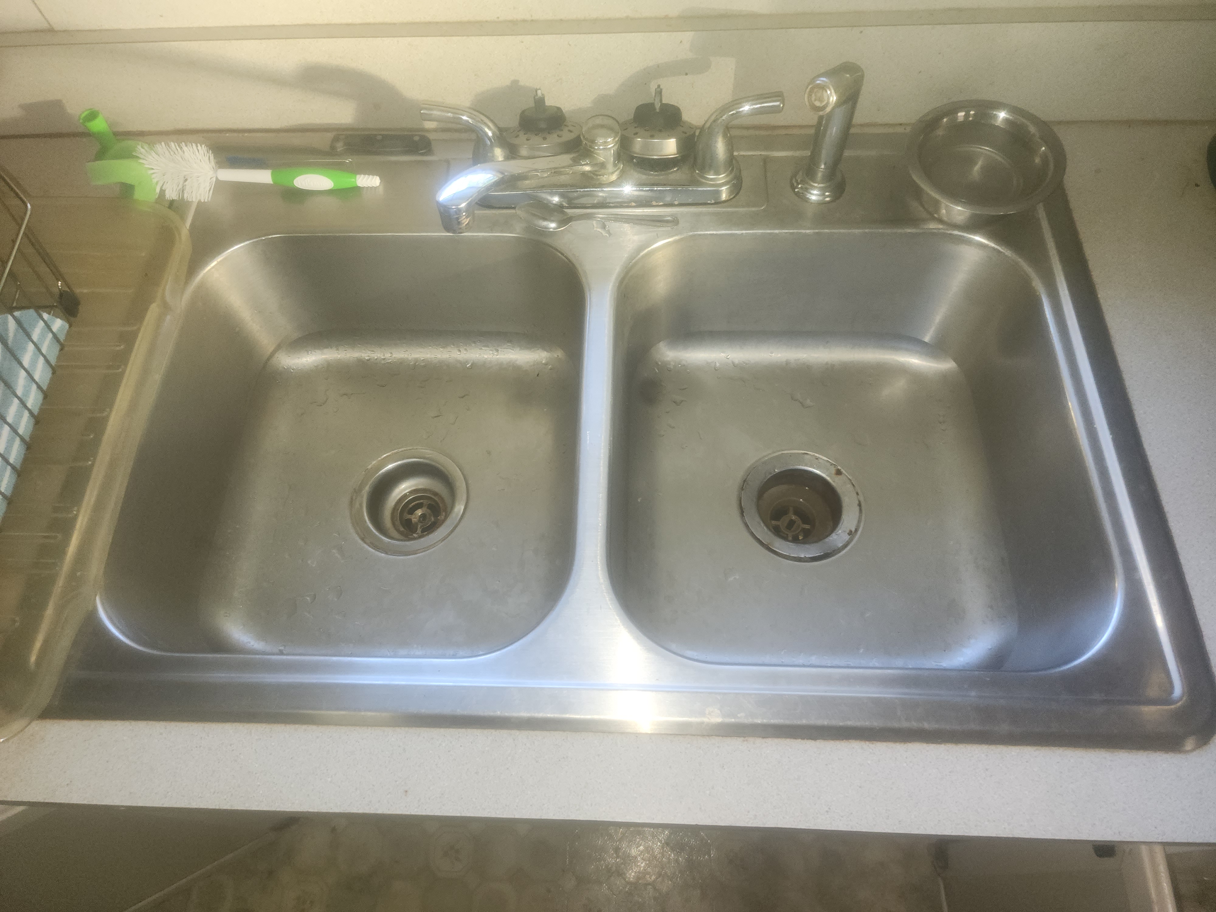 Kitchen sink installation, completed and ready to use. 
