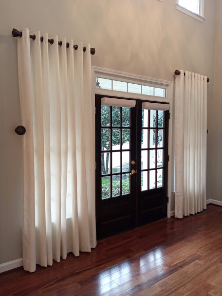 Our Design Consultant works with each customer to create their ideal space. In this case our customers wanted to add a statement to their entryway with drapery panels and it was also important to allow light to enter the space. The solution was light filtering drapery panels that can be pulled aside