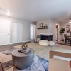 Living room with fireplace and dining area