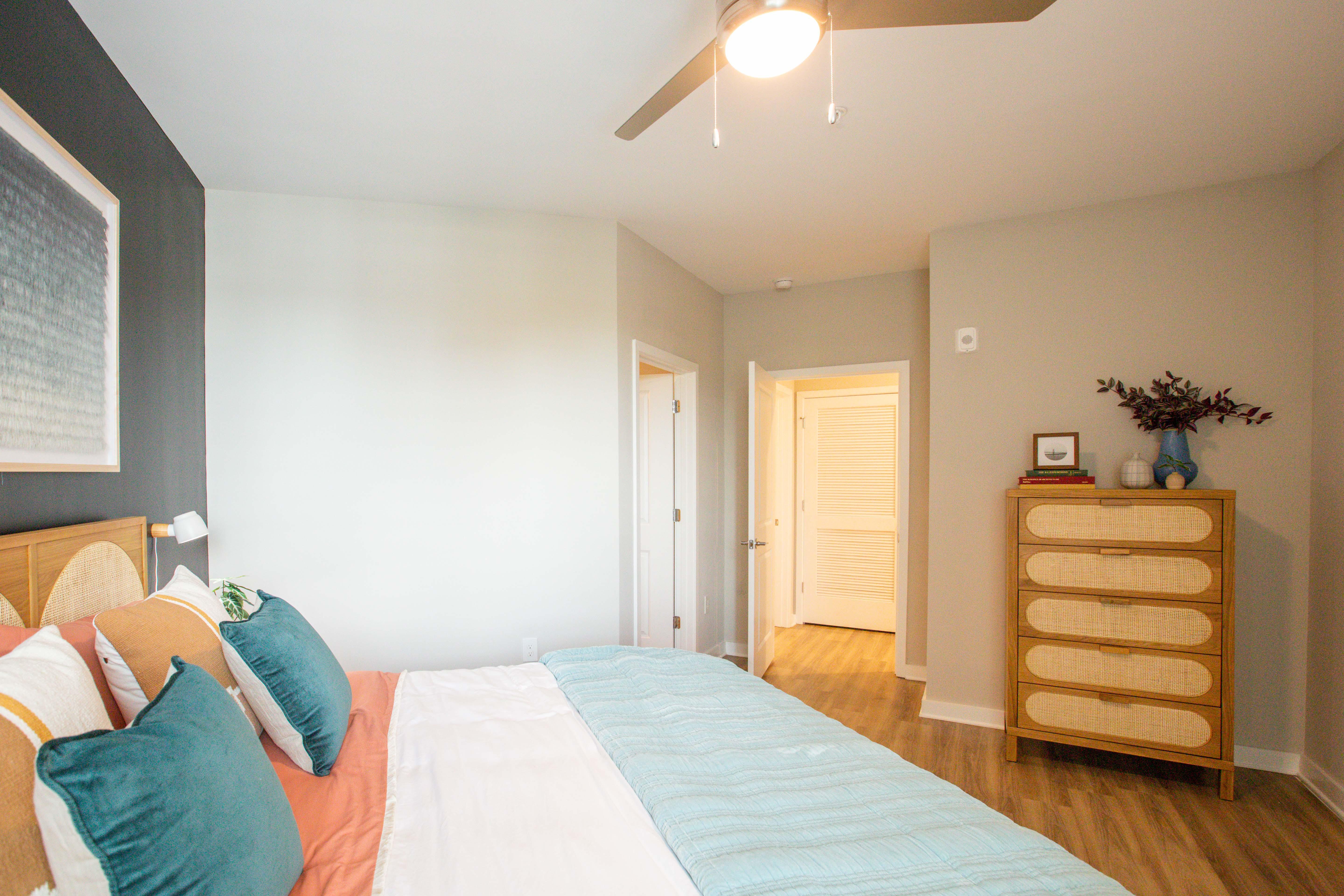 Lighted ceiling fans in bedrooms and living room.