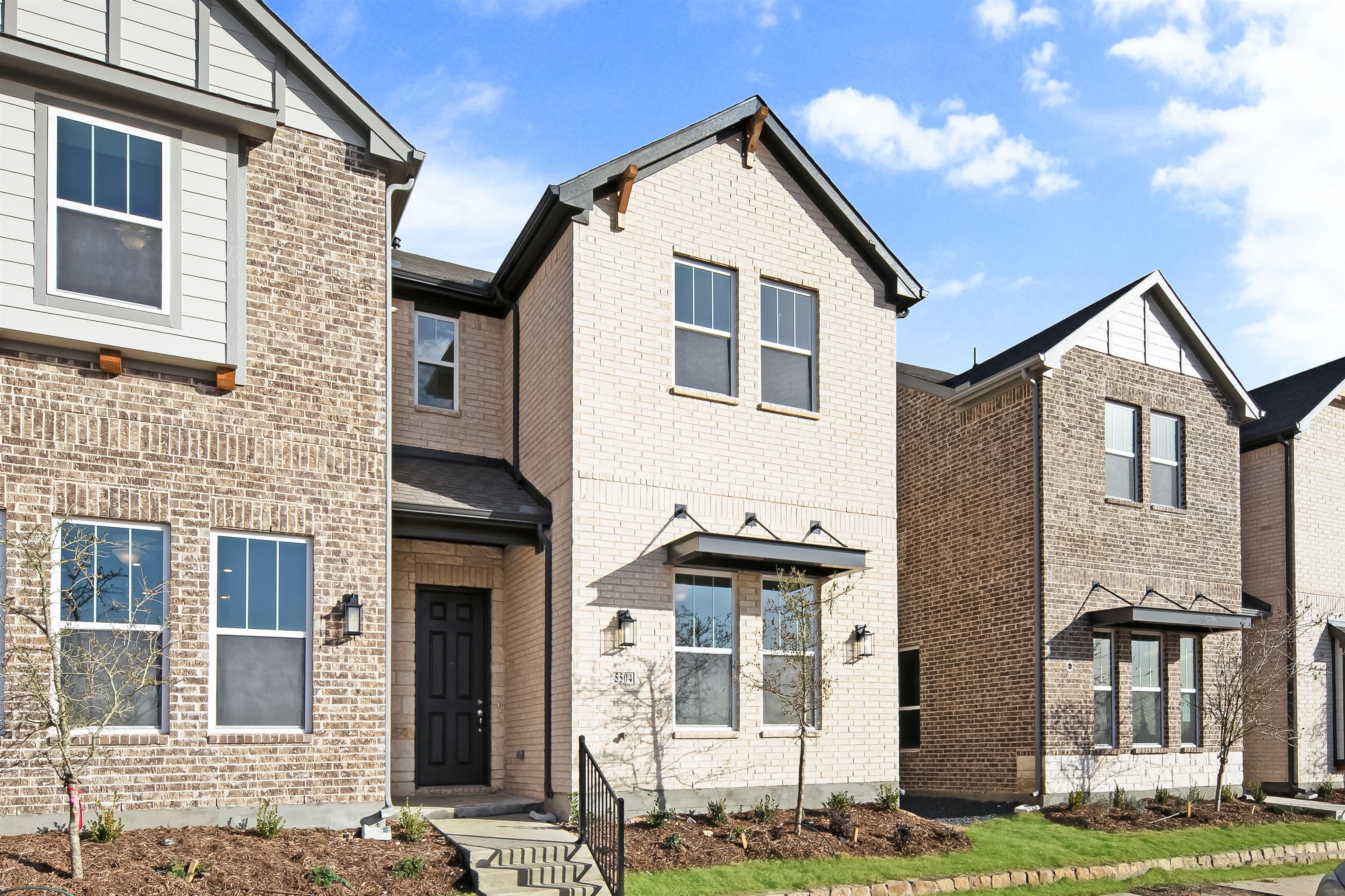 The  Station Townhomes by Ashton Woods in Sachse TX