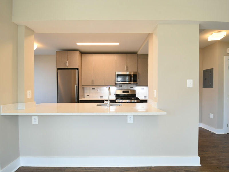Embassy Tower Apartments Empty Kitchen and Bartop