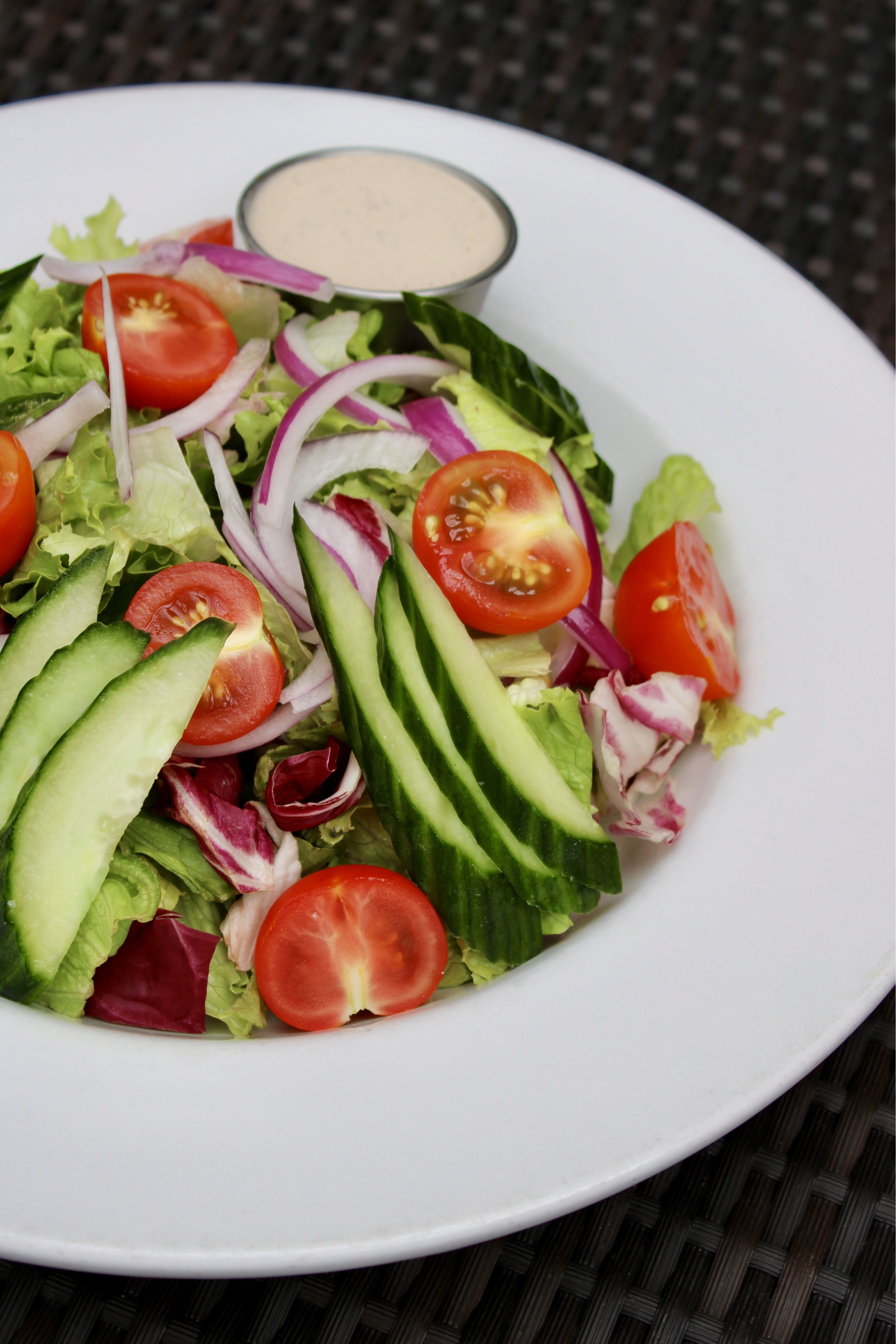 Mama's House Salad: mixed greens, cherry tomatoes, cucumbers, etc. 