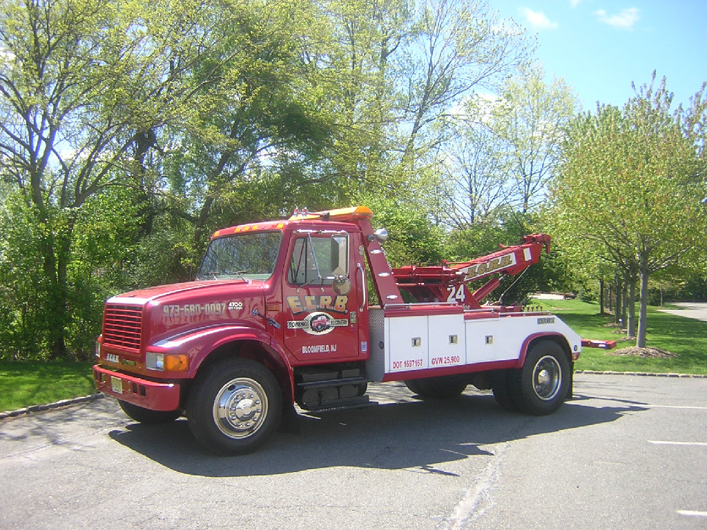 E.C.R.B. (Essex County Recovery Bureau, Inc.) is a privately owned, family business established in 1997.  Our hard work and dedication have allowed us to rise above the rest, break the stereotype and become so much more than your typical towing company. We take pride in our ability to provide professional prompt service to all of our customers 24/7. 
 
Our courteous well-trained staff is prepared to assist you in your time of need. Our dispatch center is in constant communication with our drivers to ensure fast accurate service to our customers. All customers are important to us and treated with the utmost care, whether it’s a tire change in the mini-van, a flatbed tow, or a heavy duty recovery E.C.R.B. can handle it all.