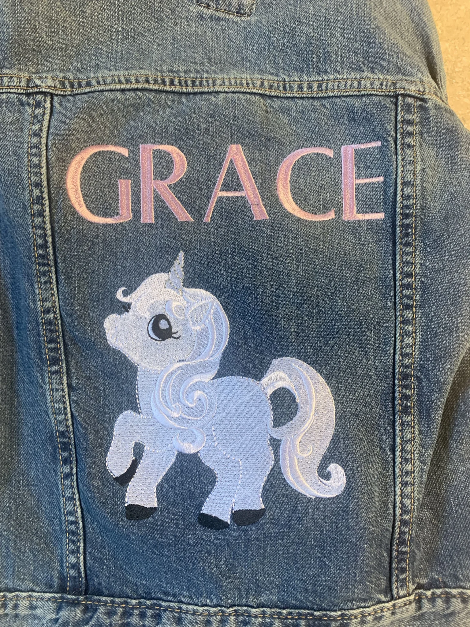 Embroidered jean jacket back