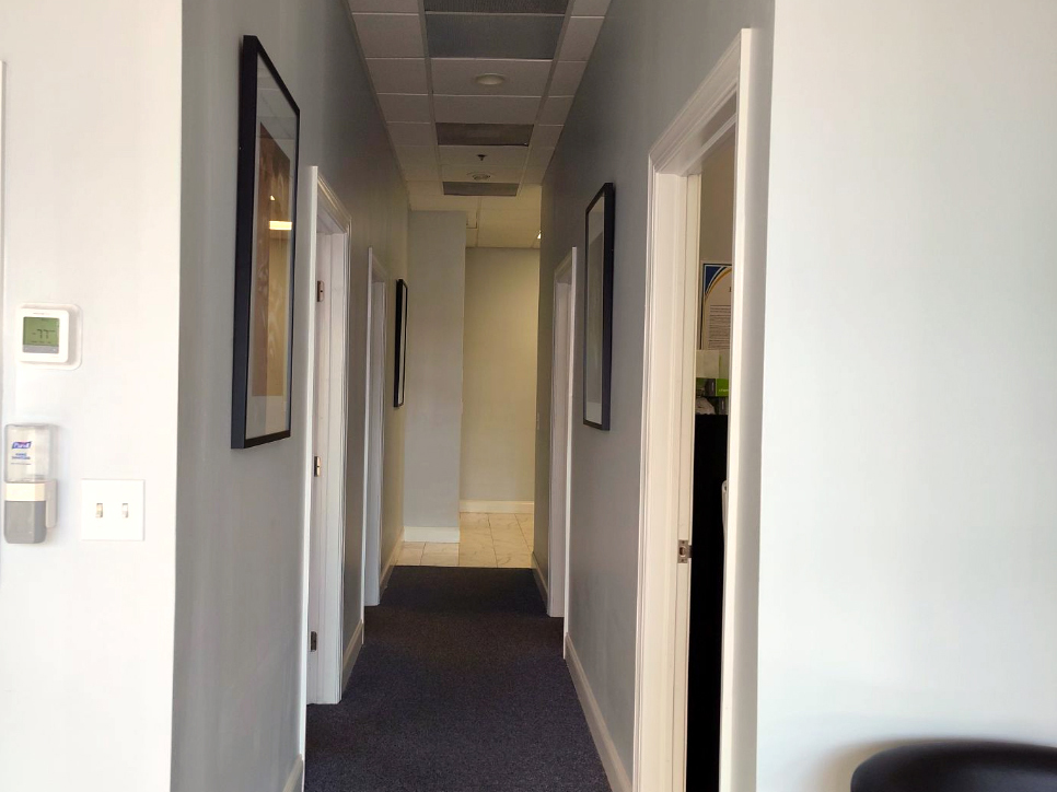 Interior photo of the hallway for AudioNova hearing clinic in Jupiter, FL