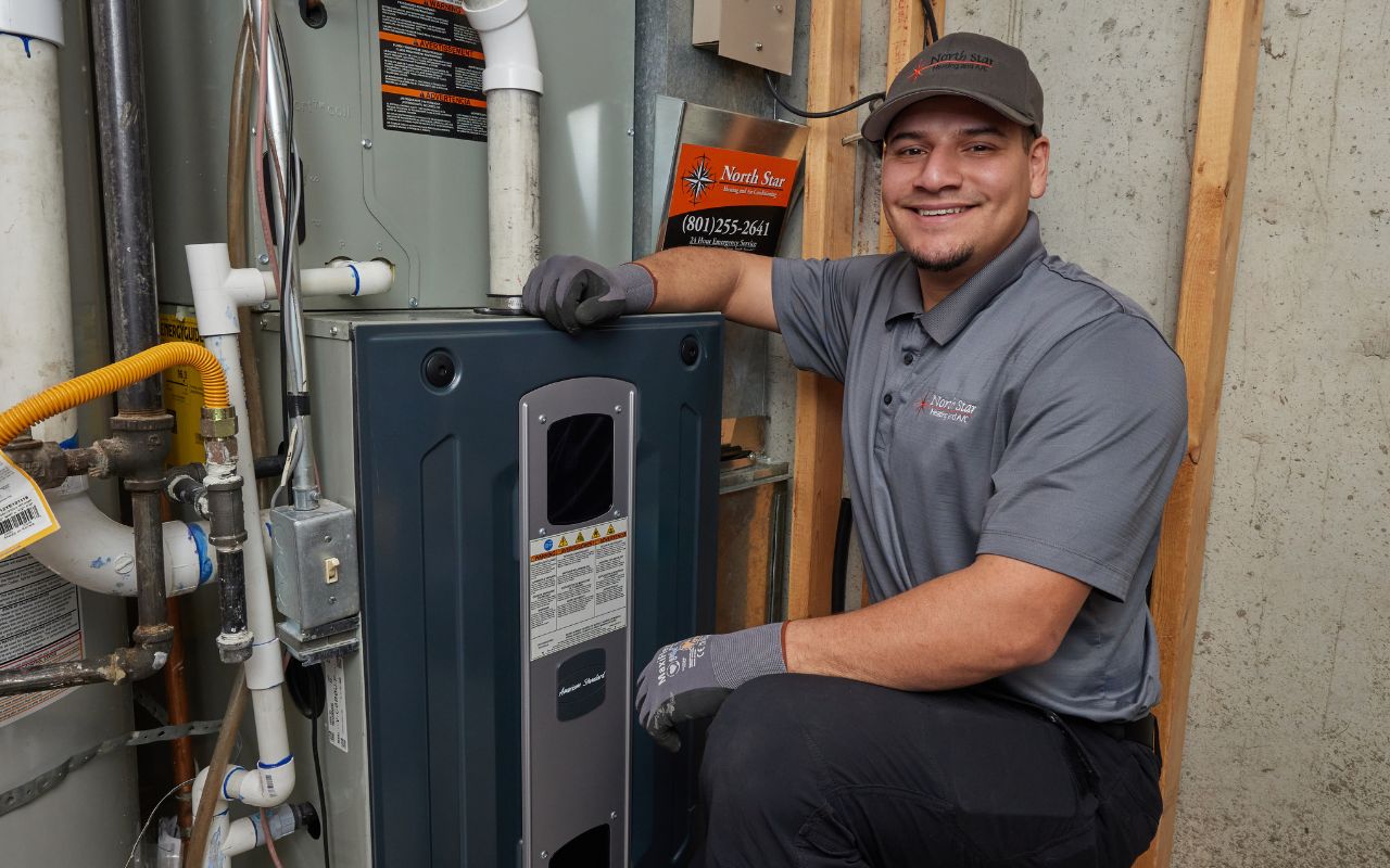 North Star Heating & Air HVAC technician after completing an ac installation in Sandy UT.