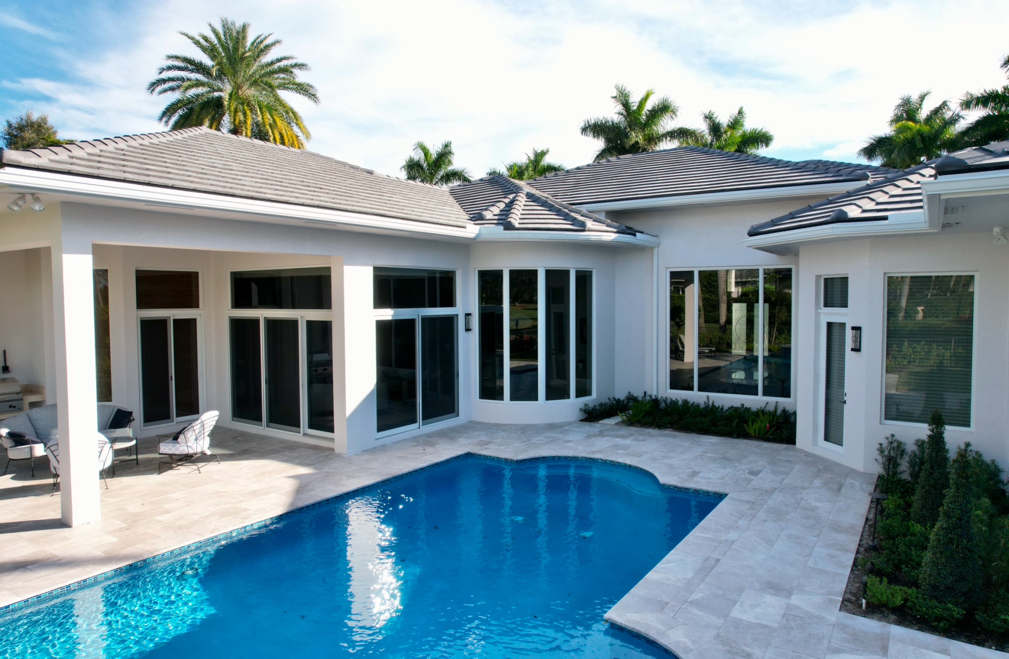 We installed brand new PGT impact windows and doors for this entire home.