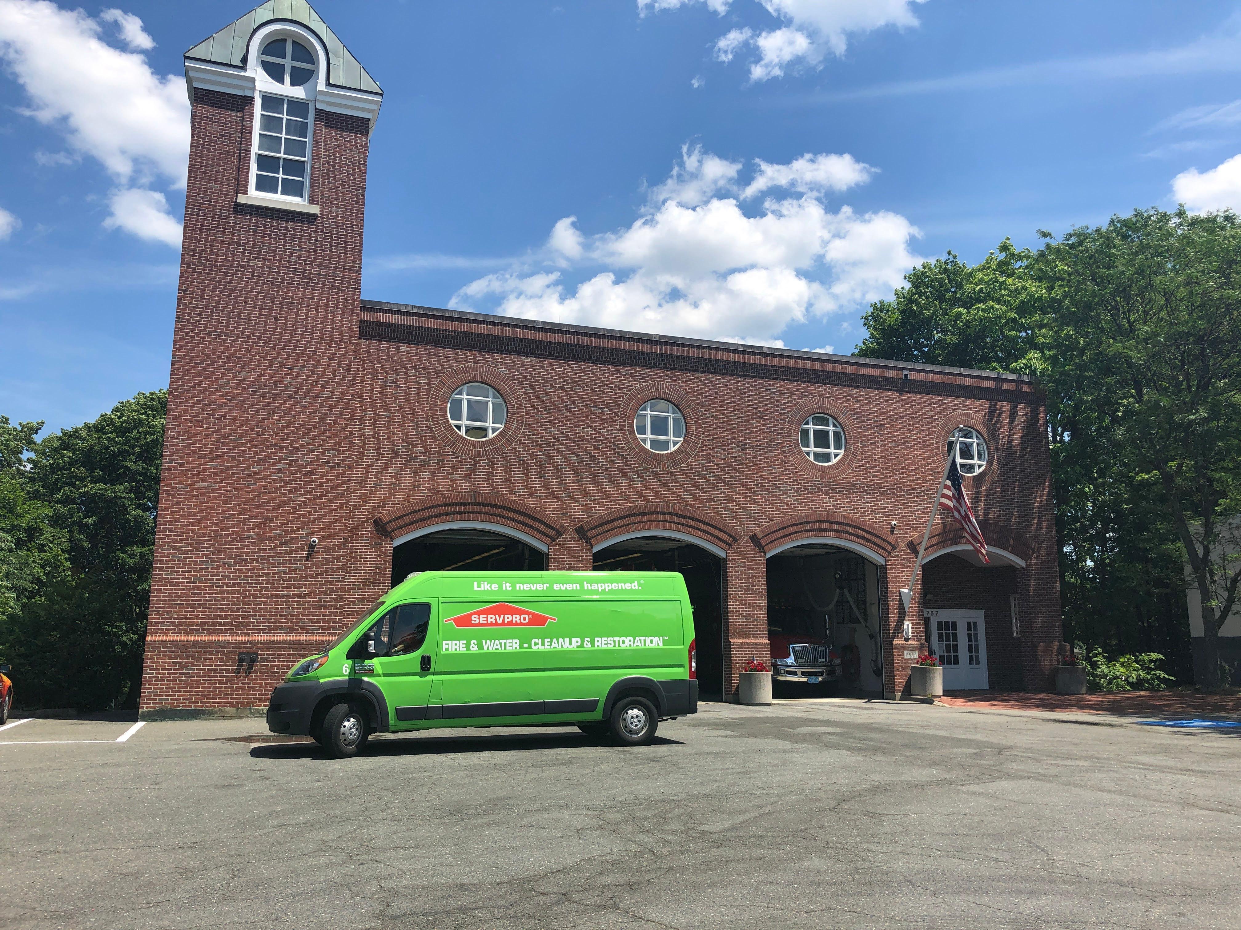 Our iconic green van parked in front of the Reading, MA Fire Department after we donated 24 cases of water to the hard-working men and women who help keep our community safe. We also made identical donations to the fire departments in Stoneham, MA, Wakefield, MA, and North Reading, MA.