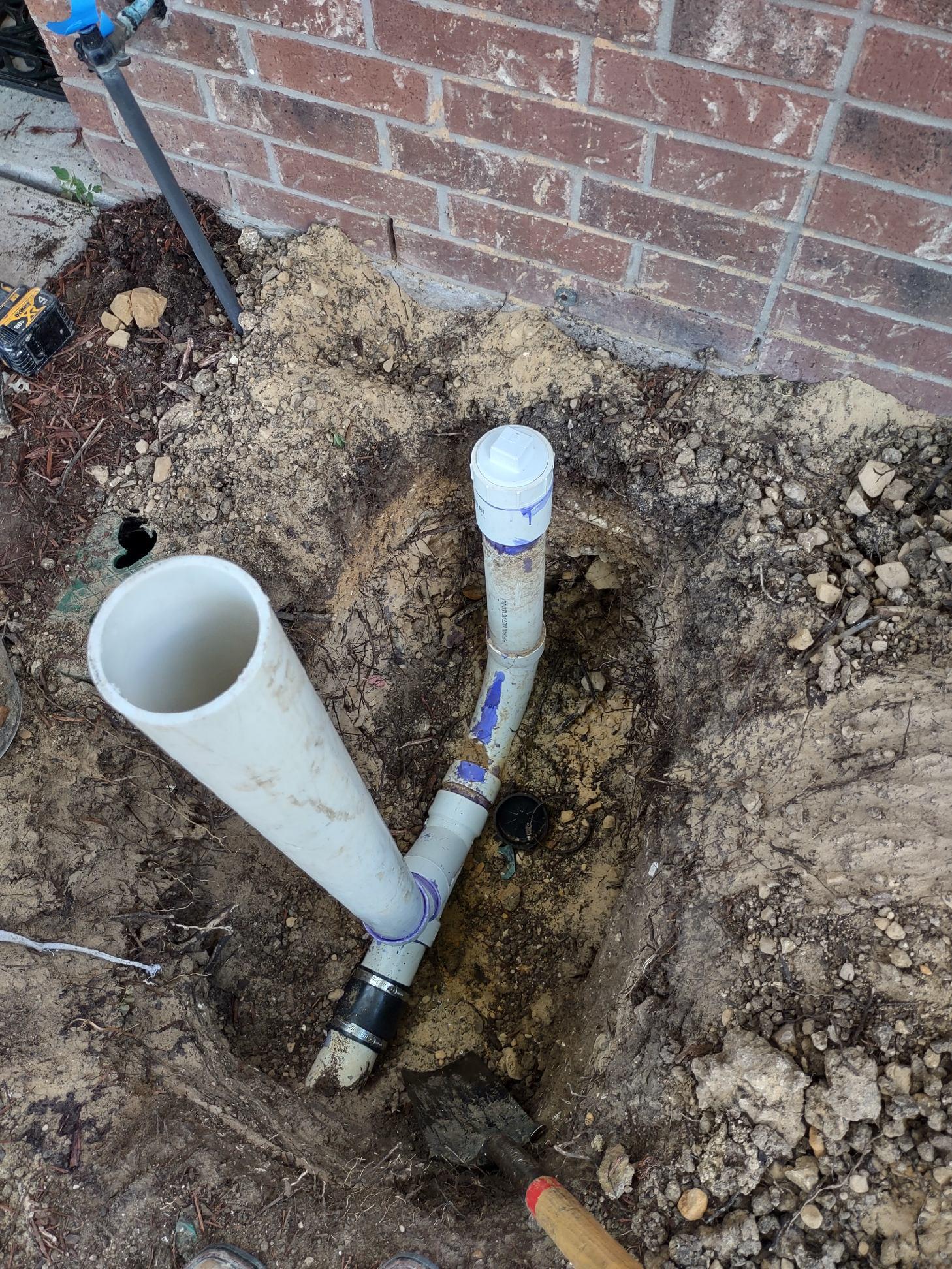 Romen~os Plumbing Services Logo