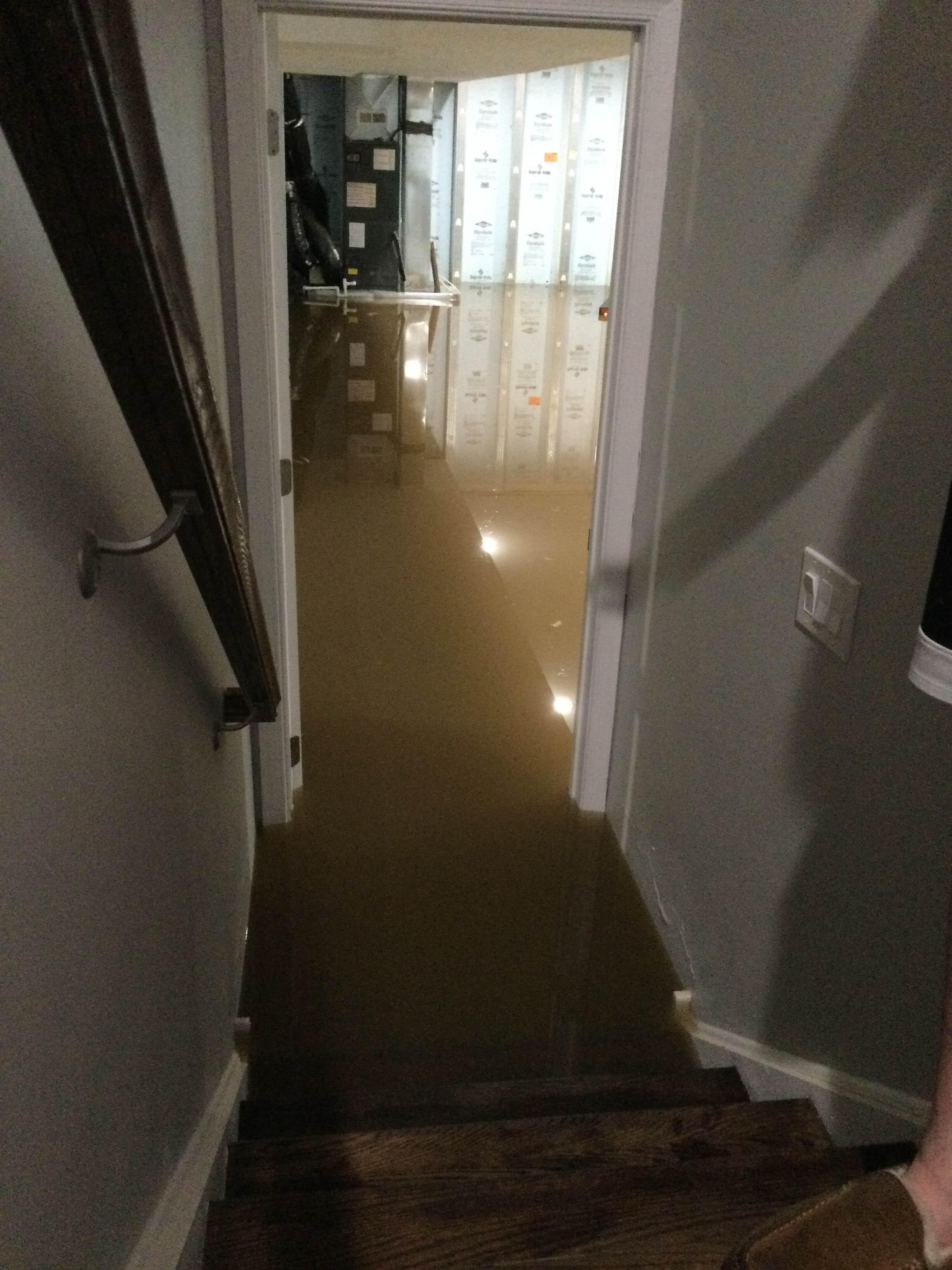 This family opened the door to their basement and were surprised to find standing water. They called SERVPRO of Langhorne/Bensalem who responded immediately to begin water restoration.