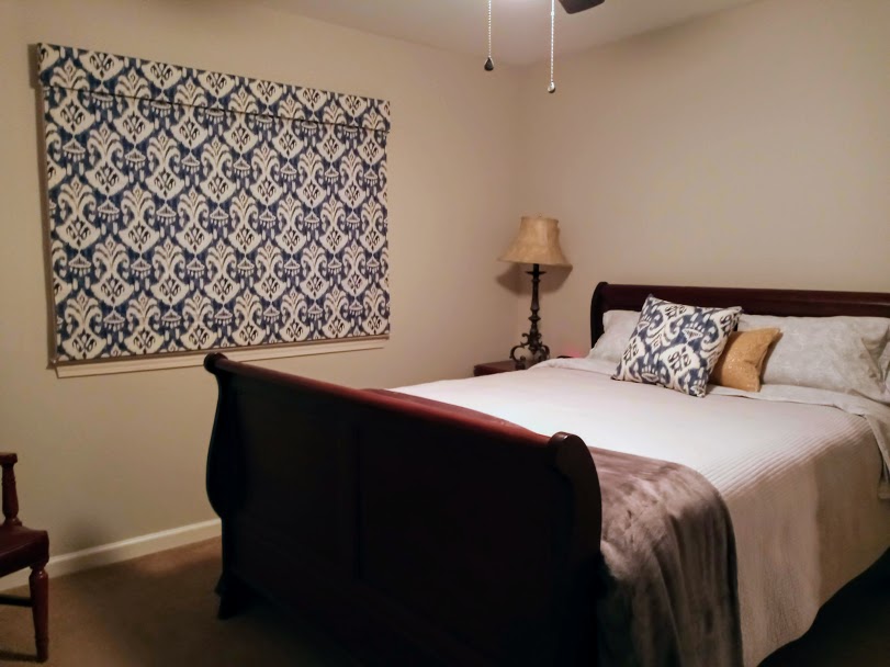What do you think of this bold pattern our customer chose for her guest bedroom? She wanted some design inspiration and picked this colored pattern to set off the room. We helped her in continuing the rest of the design process by gifting her a custom pillow in matching fabric to the Roman Shade.