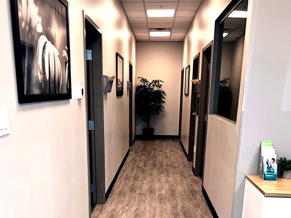 Interior photo of the hallway of AudioNova hearing clinic in Leesburg, FL
