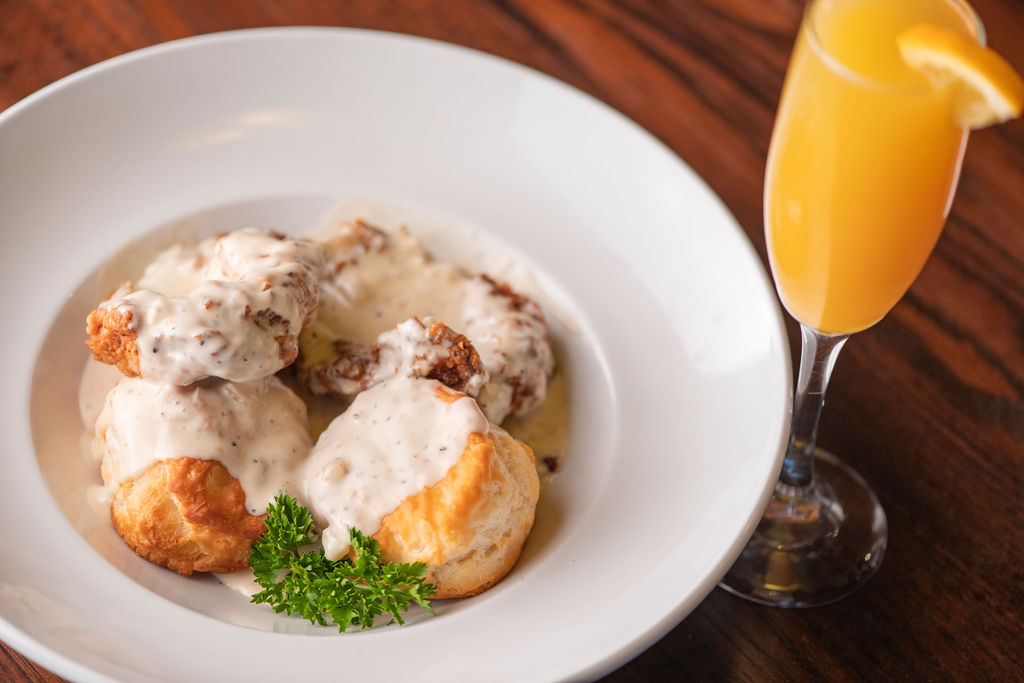 buttermilk fried chicken, biscuits topped with house-made country gravy