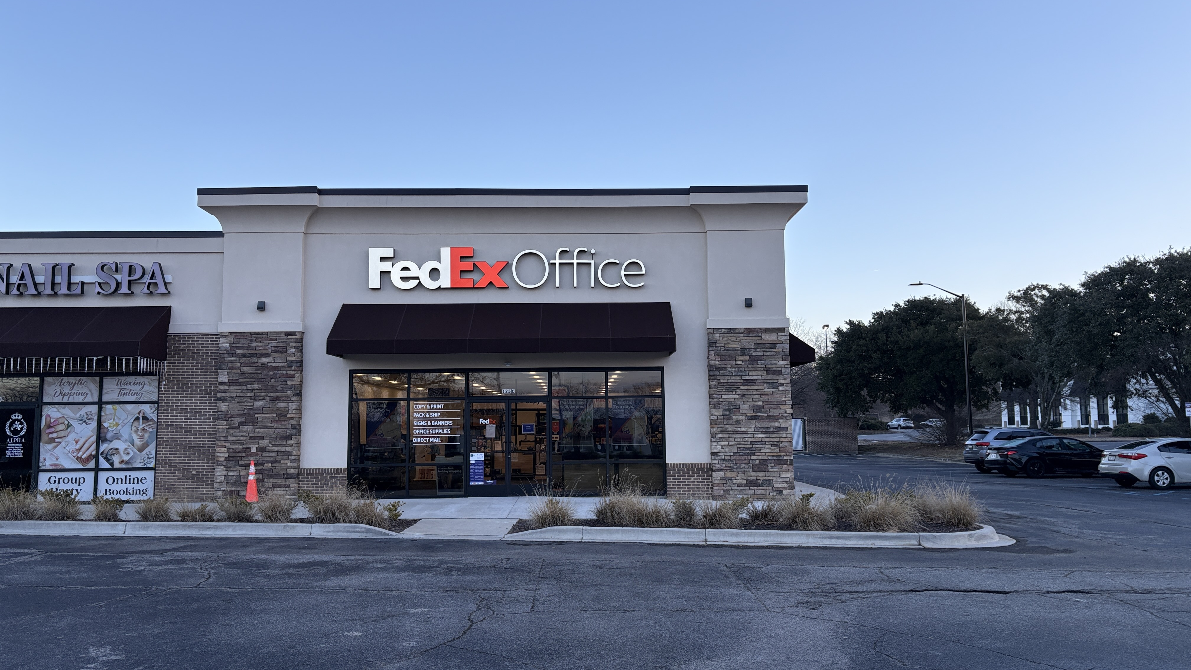 Your Columbia, SC FedEx Office: The storefront of your local FedEx Office at Columbiana Circle. We are your neighborhood hub for reliable printing, packing, and shipping services.