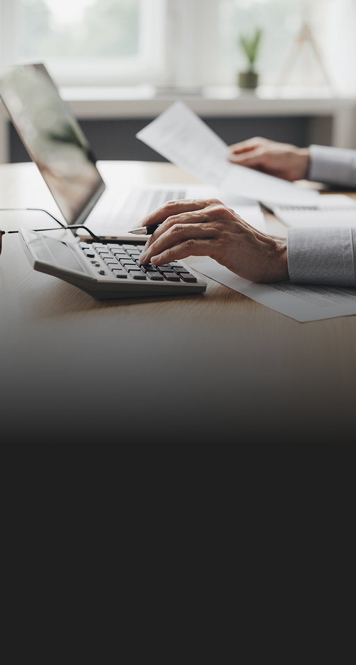 An advisor using a calculator.