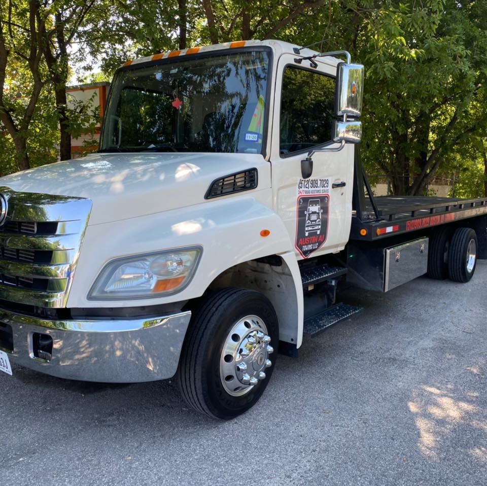 Austin AJ Towing Logo