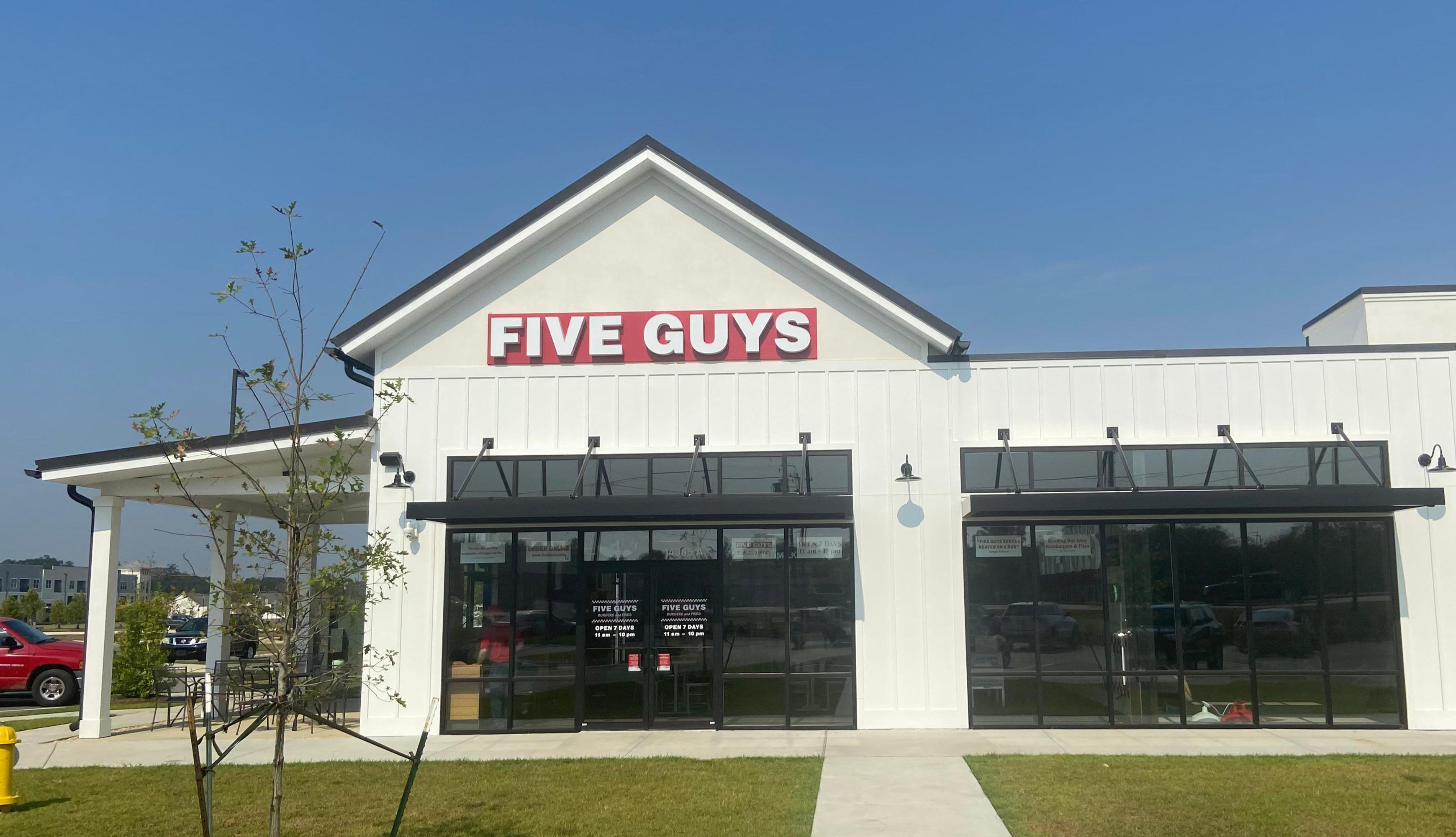Exterior photograph of the Five Guys restaurant at 4022 Pacific Ave. SE in Central, Louisiana.