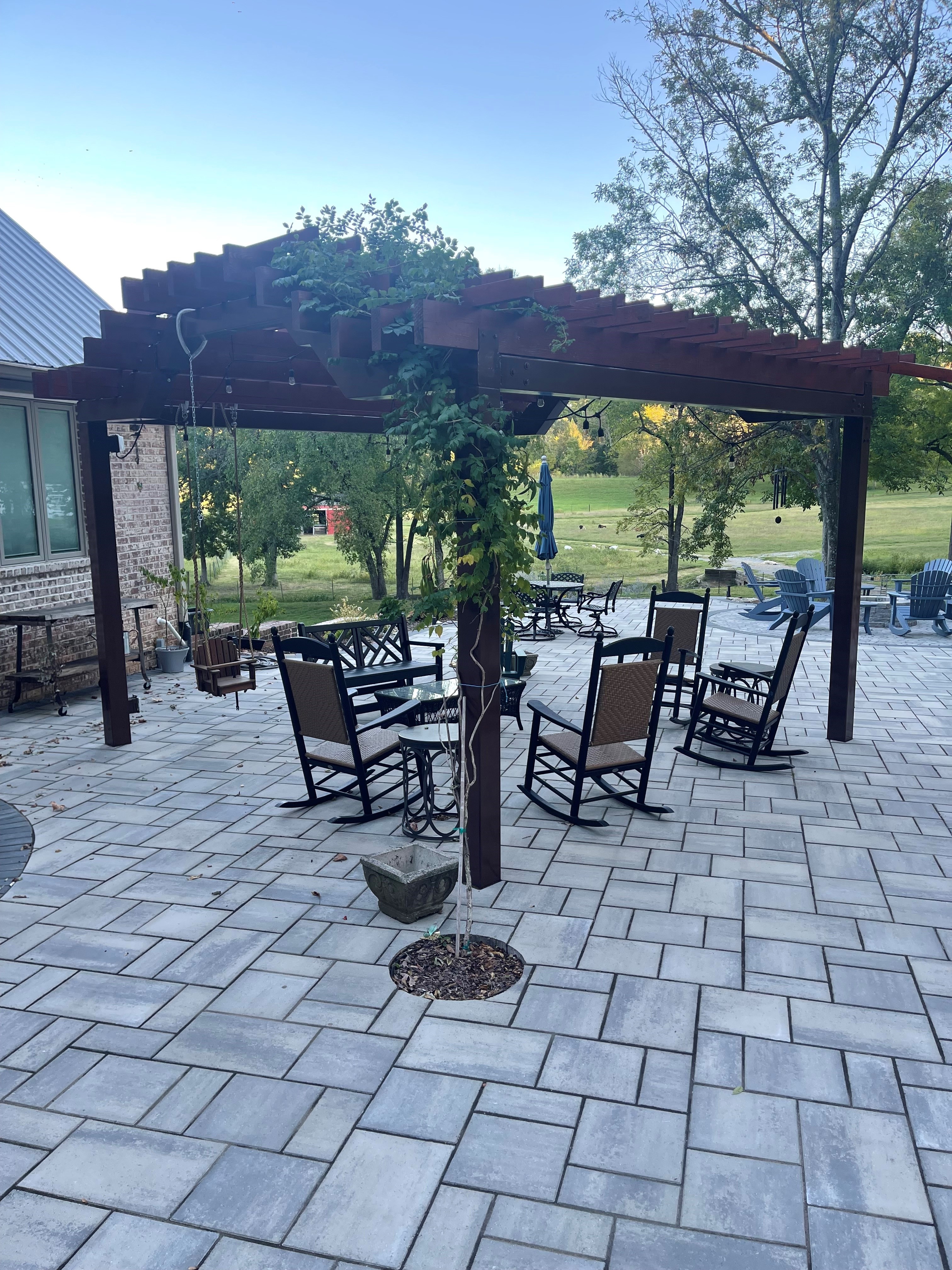 outdoor living pergola and paver patio