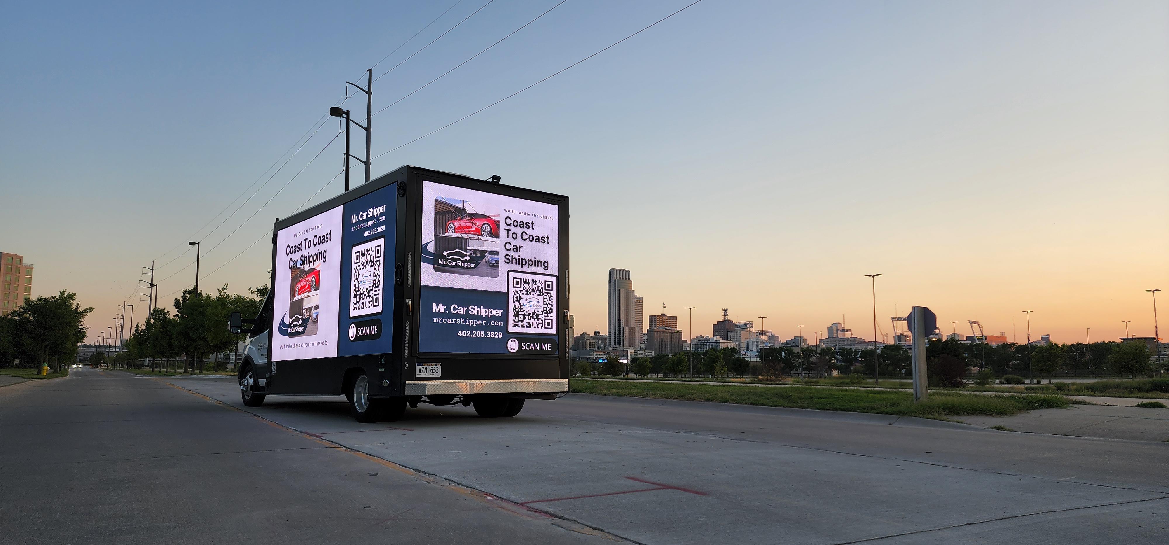 Lead Innovations mobile digital billboard truck in Omaha NE with ad for Mr. Car Shipper