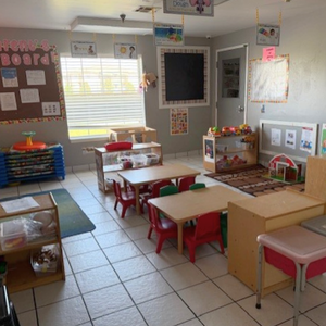 Bright and colorful preschool classroom at Childcare Network with age-appropriate learning materials 