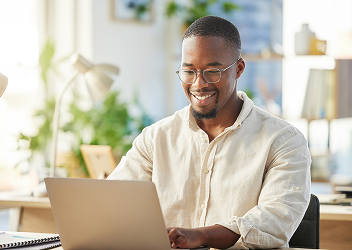 An RBC DS client looking over their statements.