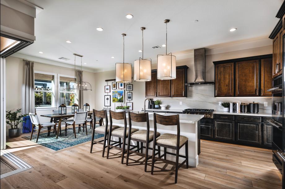 The kitchen offers expansive cabinets and counter space 